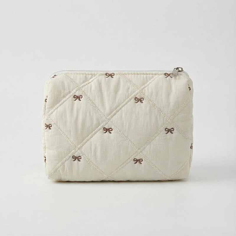 CREAM BOW MAKEUP BAG