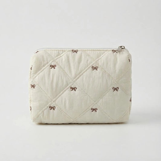 CREAM BOW MAKEUP BAG